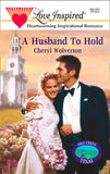 A Husband To Hold (Mills & Boon Love Inspired): First edition by Cheryl Wolverton (9781472020703)