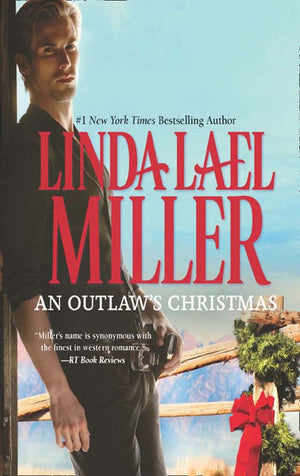 An Outlaw's Christmas (The McKettricks): First edition (9781472000811)