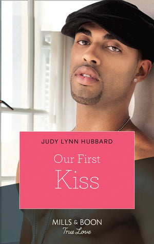Our First Kiss (Kimani Hotties, Book 44) by Judy Lynn Hubbard