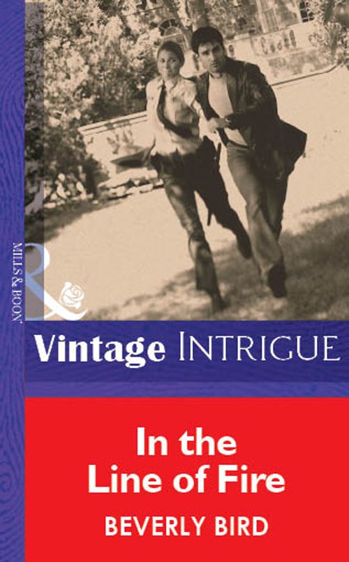 In The Line Of Fire (Mills & Boon Vintage Intrigue): First edition by Beverly Bird (9781472077202)