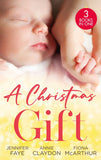 A Christmas Gift: Her Festive Baby Bombshell / Firefighter's Christmas Baby / Midwife's Mistletoe Baby by Jennifer Faye, Annie Claydon and Fiona McArthur