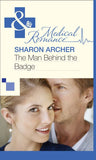 The Man Behind the Badge (Mills & Boon Medical) by Sharon Archer