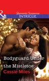Bodyguard Under the Mistletoe (Mills & Boon Intrigue): First edition (9781472057860)